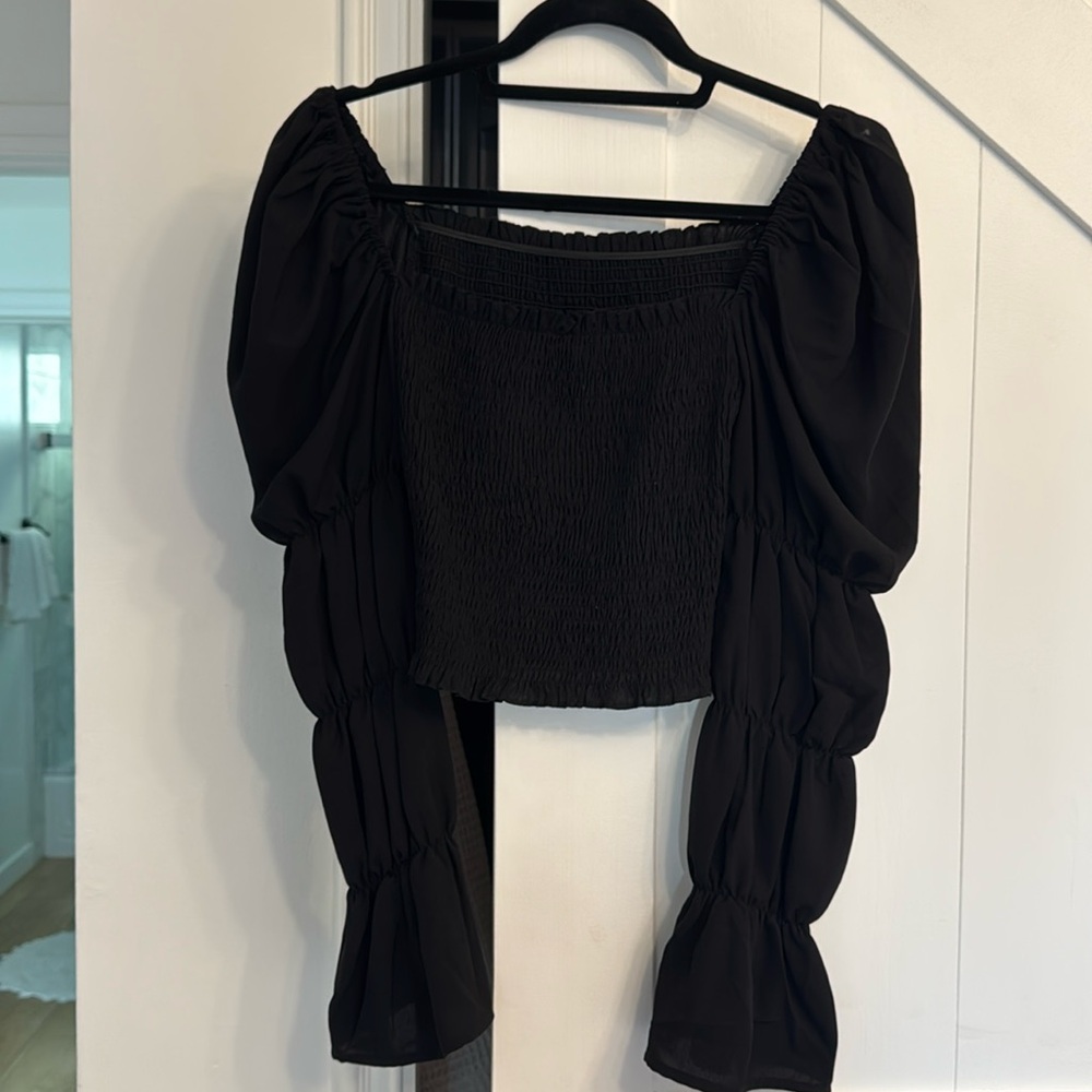 Black ruffled long sleeve top
